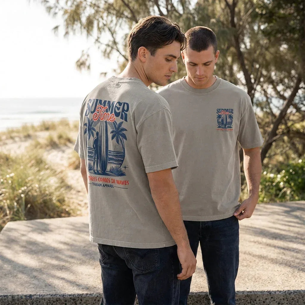 Men's Happiness Comes In Waves enzyme washed cotton t-shirt by Threads 626, worn by a model outdoors, showcasing relaxed fit and soft fabric.